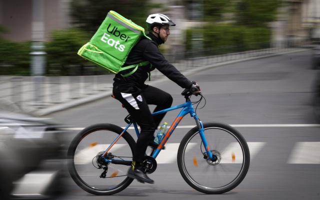 An Uber Eats courier is seen in Bucharest, Romania on May 1, 2019. (Photo by Jaap Arriens/NurPhoto via Getty Images)